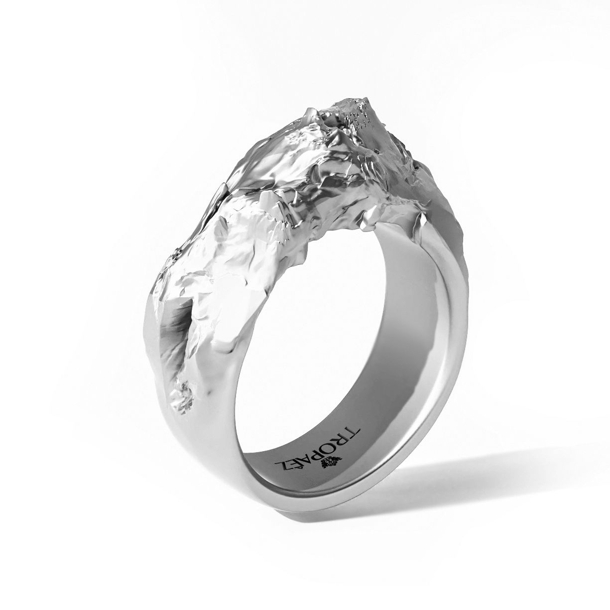 Cascades Ring in White Gold by Tropaêz, featuring bold peaks and plunges, 9mm wide--side angle view.