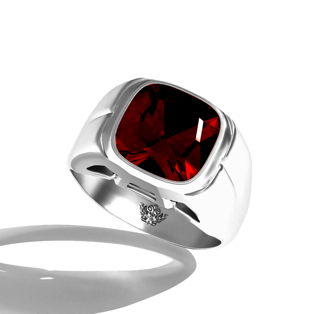 Grand Touring Ring in White Gold by Tropaêz, featuring a deep red garnet and resort styling--seen from above.