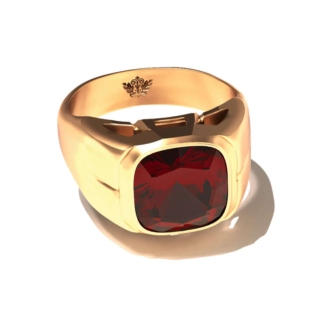 Grand Touring Ring in 20k Yellow Gold by Tropaêz, featuring a deep red garnet and resort styling.